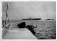 HMS Ark Royal survivors leave on a destroyer