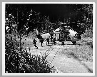 A Wessex helicopter landing a stick of Commandos. Borneo c.1962-66. (RMM)